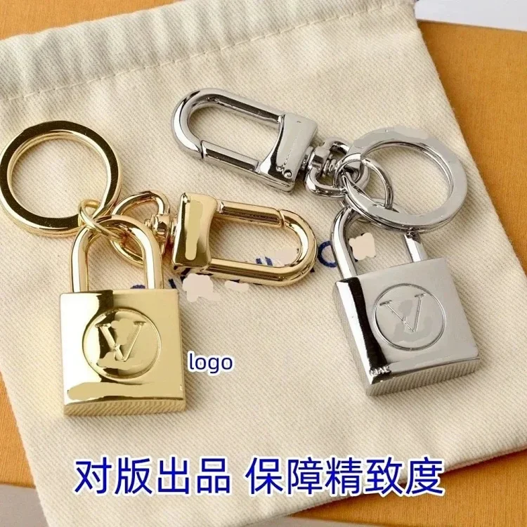 LOUIS VUITTON Lock Keychain [2