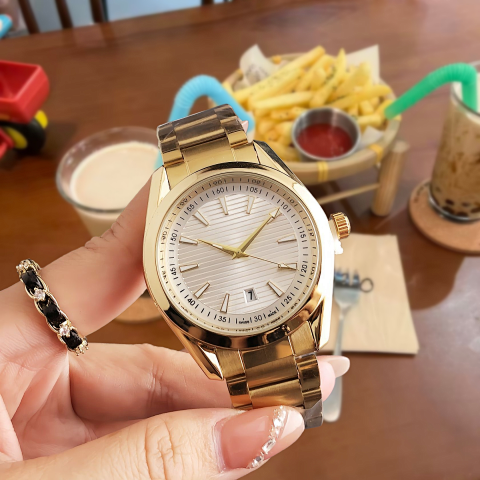 Gold Tone Round Dial Watch